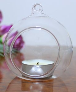 Tea light candle in glass orb