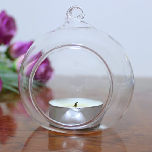 Tea light candle in glass orb