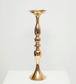 Gold Candlestick Holder on plinth