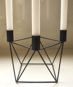 Black candle holder with 4 white tapered candles