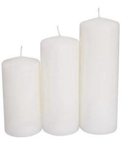 Group of three white pillar candles