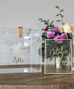 Clear box with gold text saying wishing well