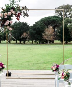 Square golden arch with floral arrangement