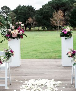 Pair of white Plinth Stands with floral arrangements