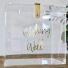 Clear box with gold text saying wishing well