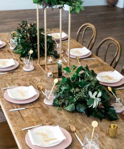 Modern wedding reception gold table setting