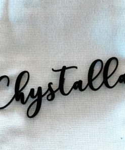 Black wording saying 'Chystalla'