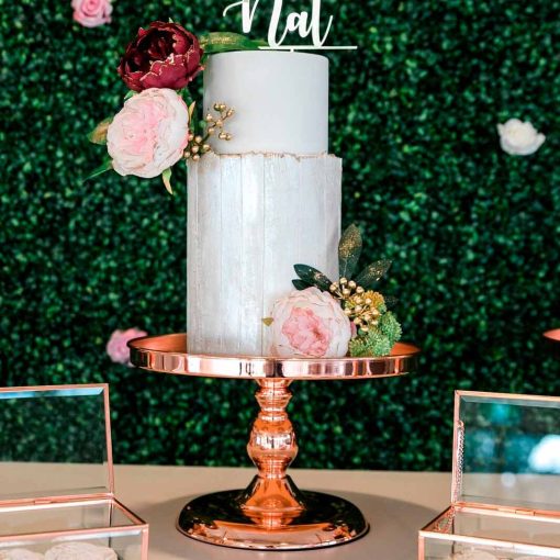 Cake stand displaying wedding cake