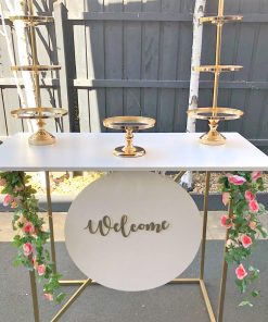 Dessert Grazing Table with welcome sign and gold cake stands