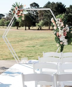 Hexagon 3D arch adorned with flowers in park