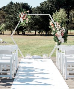 White hexagon 3D arch with floral attachments for park wedding