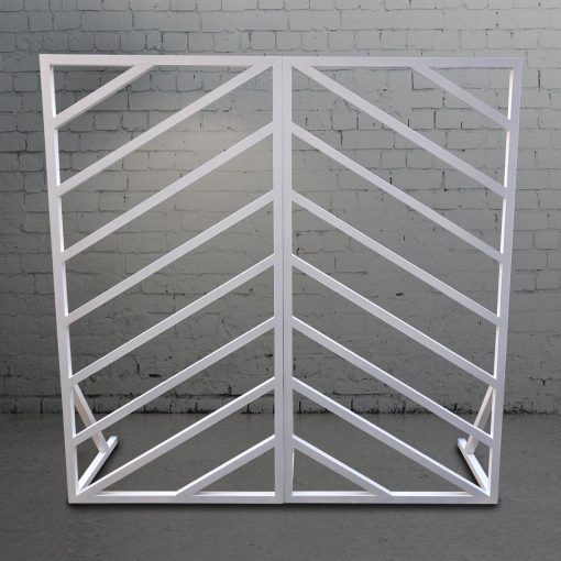 Two joined together white window panel backdrops each 2m high by 1m wide. Each frame has 8 diagonal slats.