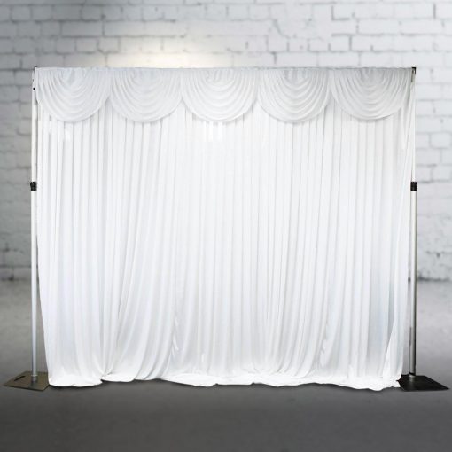 White silk curtain with scalloped sash at top